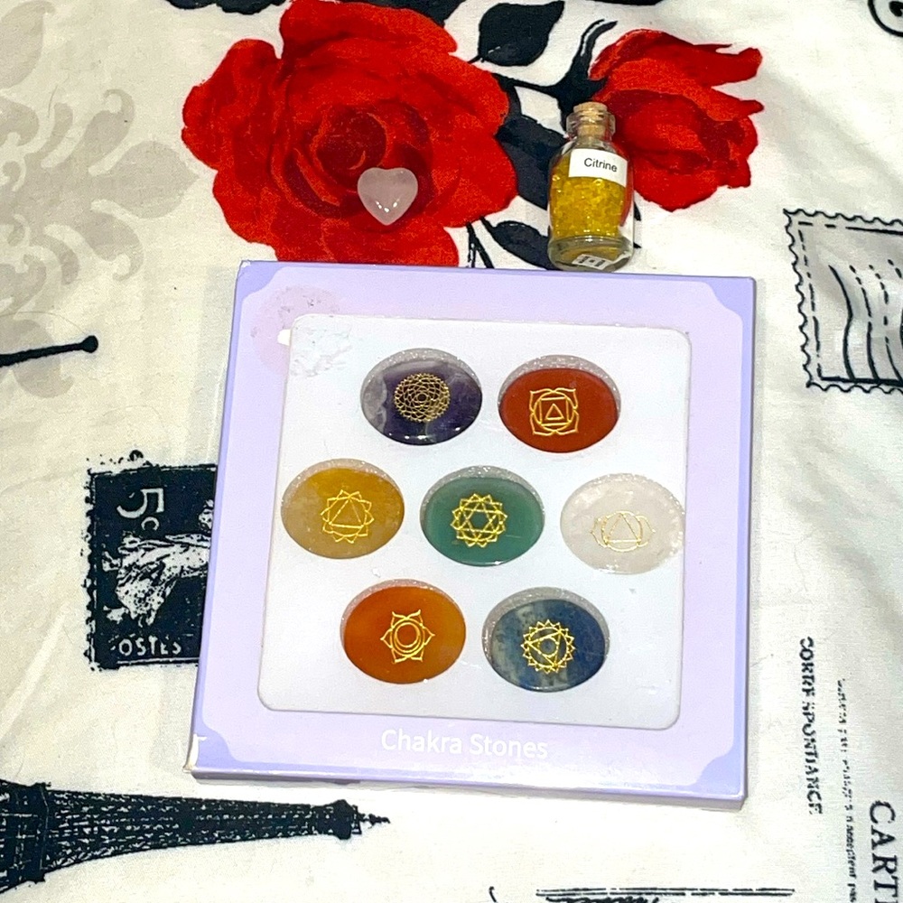 Chakra Healing Stones, heart shaped rose quartz, and a bottle of citrine